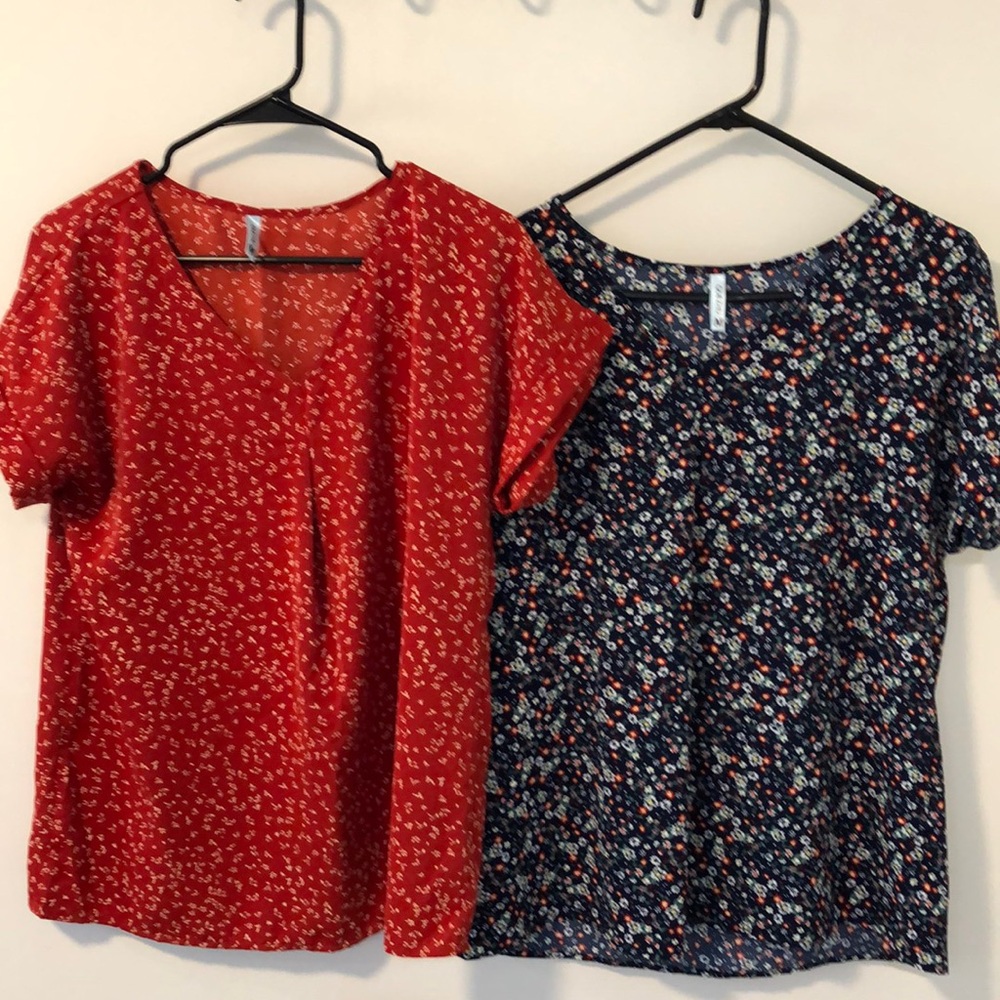 Bundle of two women’s V-neck blouses with rolled cuffs on sleeves
